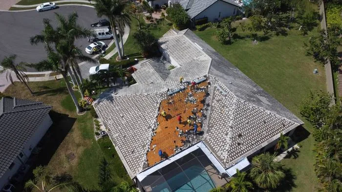Live job photo — crew installing tile roof
