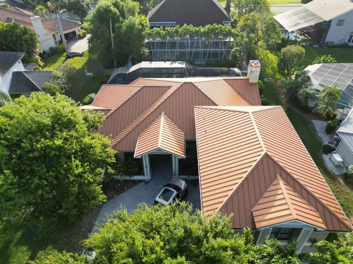 Copper-tone metal roof — full house aerial