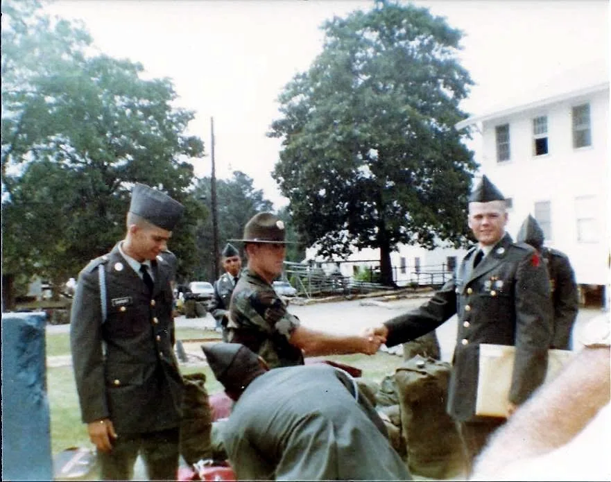 Drill sergeant handshake on graduation day at basic training