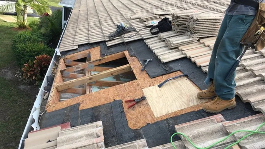 Blue Dog crew with several sections of a tile roof opened to the deck at Preserves at the Shores