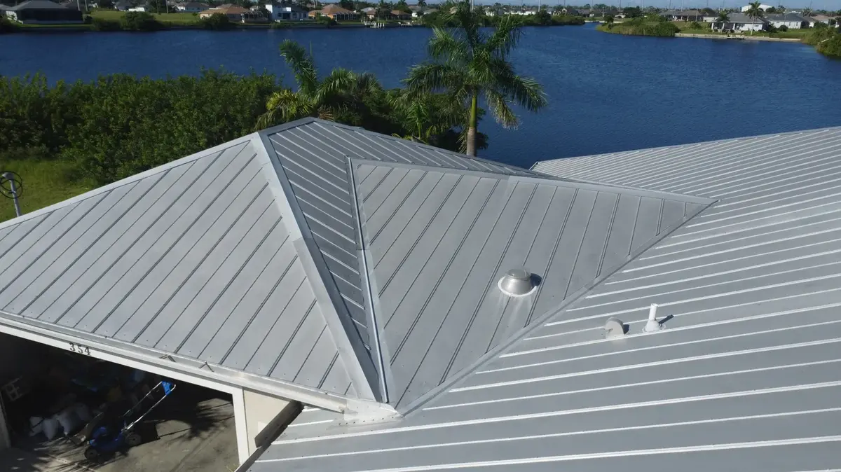 Gray standing-seam metal roof on an Estero home