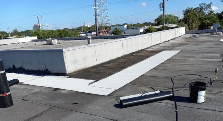 estero flat roof replacement